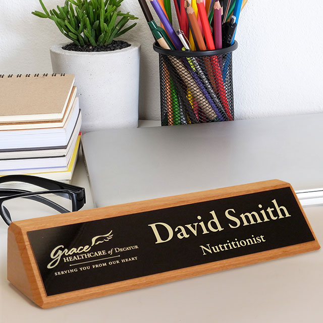 Desk wedge used to recognize success.