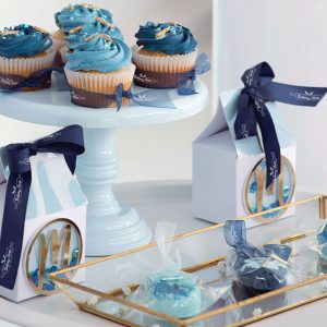 Using ribbon rolls wrapped around cupcakes is a great way to provide one of the key benefits of ribbons: product packaging.